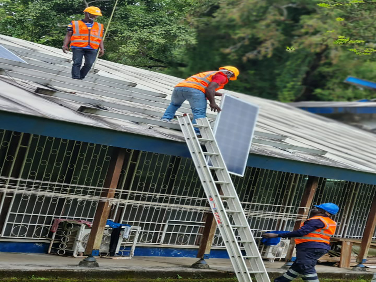 fintrustafrica solar panels with men working on rough